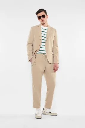 Pantaloni slim-fit con coulisse e catena